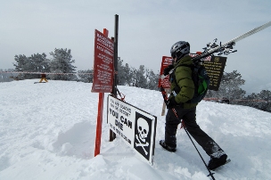 A backcountry gate at the top of the Ninety-nine Ninety lift at the Canyons Resort in Utah serves up ample warning about the potential for disaster. 