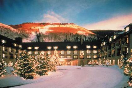 A view of the Vail Cascade front entrance with direct access to Vail Mountain in the background.