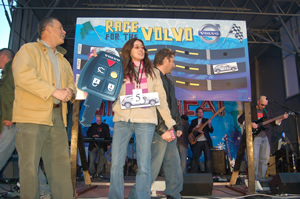 Leadville’s Renya Romero accepts the keys to a brand-new Volvo C-30, the grand prize giveaway to conclude the season-long Street Beat free concert series in Vail Village.