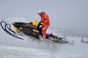 Tyson Bolduc rides through powder at the Vail Pass Recreation Area on his way to another run down Ptarmigan Peak. Snowmobiles are a popular replacement for ski lifts, especially during the last week of the year, when Vail and Beaver Creek passes are restricted for some.  