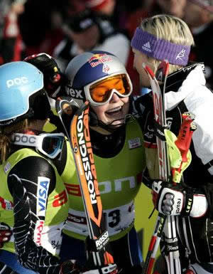 Vail's Lindsey Vonn is mobbed after winning the 10th World Cup race of her career Saturday in St. Anton, Austria.