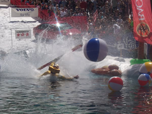 Olympic medalist Jonny Moseley is now an expert at announcing pond skimming competitions like this one at Vail.