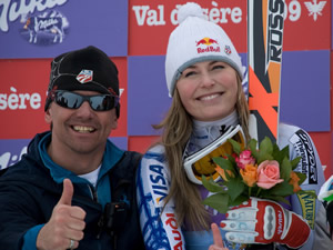 Lindsey Vonn gives the thumbs up after winning a World Championships downhill Monday. She later injured the same thumb grabbing a broken champagne bottle.