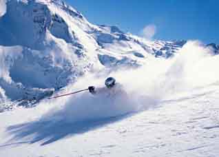 Herb Manning eats up the powder in T-ride's backcountry.