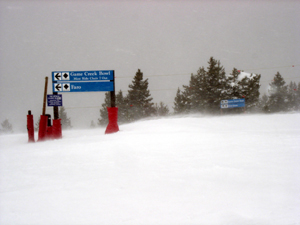 With warm weather, a bit of  wind, try sunny Arrowhead and Bachelor Gulch