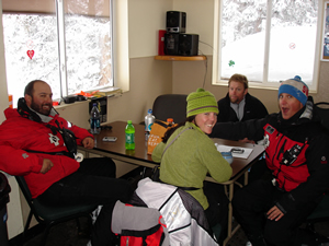 Gathered in a ski patrol hut at Wildwood on Vail Mountain