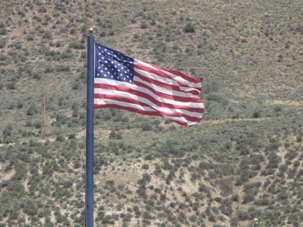 <strong>OH, SAGE, CAN YOU SEE: </strong>A giant flag flutters above Wal-Mart in Avon, with the surrounding sage-encrusted hillsides as a majestic backdrop.