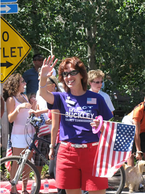 Eagle County commissioner candidate Debbie Buckley, of Avon, works the crowd Friday during the Vail America Days Fourth of July Parade in Vail.