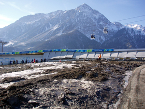 Global warming is a reality, not a debate, in Europe, where a decades worth of warming has left the Alps barren of snow in some places, often times year-round. The bobsled course at the 2006 Torino Olympics, shown above, was surrounded by mud, not snow, despite that it was one of the highest-altitude courses built in Olympic history.  A last-minute snowstorm allowed television crews to shoot their prescribed snowy Alps footage, but the snow barely lasted the length of the Games. 