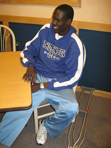 War refugee Dey Tuach, originally from Sudan and now a track star at Thornton High School near Denver, relaxes in the Vail Valley Medical Center cafeteria after knee surgery at the Steadman-Hawkins Clinic Tuesday, Jan. 8.